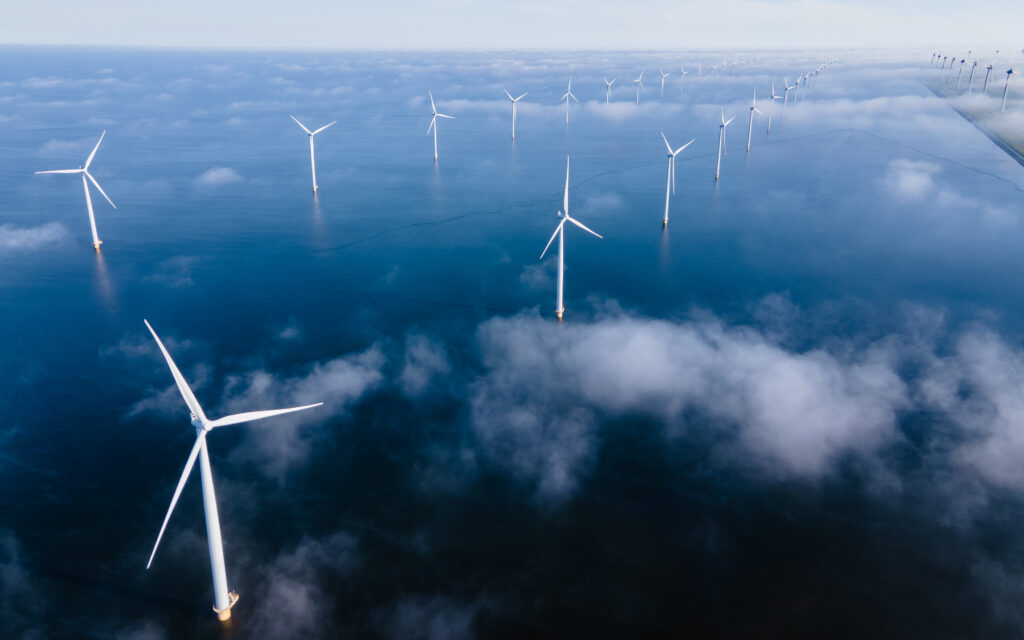 Windmill turbines at sea a huge winmill park in the Netherlands during winter